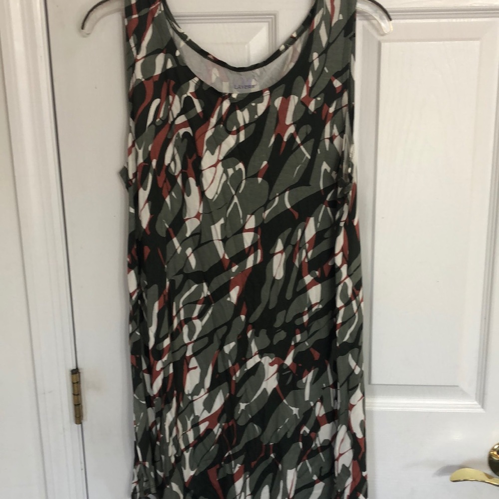 Long cami. Never worn. Wear under tunics.